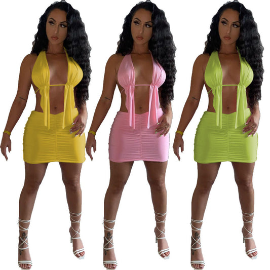 Conjunto de dos piezas de top y falda irregulares con tirantes halter de color liso para mujer