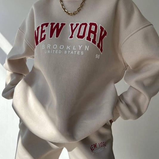 Conjunto de dos piezas de suéter y pantalones de manga larga de forro polar grueso con estampado de letras y nombre de ciudad para mujer, informal, de invierno