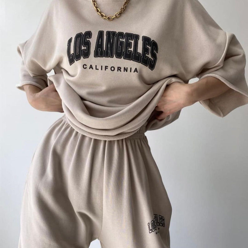 Conjunto de sudadera y pantalones de manga corta con estampado de letras y nombre de ciudad para mujer