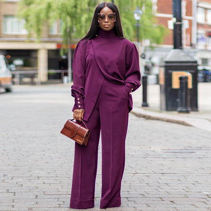 Conjunto de dos piezas informal de mujer con cuello alto irregular y manga larga con abertura y pantalones holgados