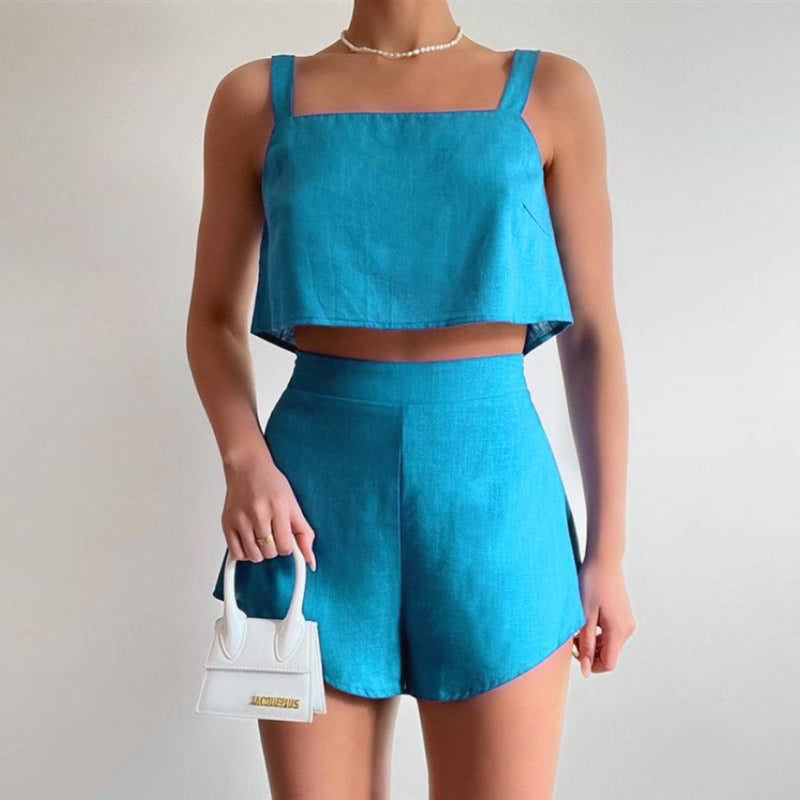 Conjunto de dos piezas de camiseta sin mangas y pantalones cortos de color liso para mujer