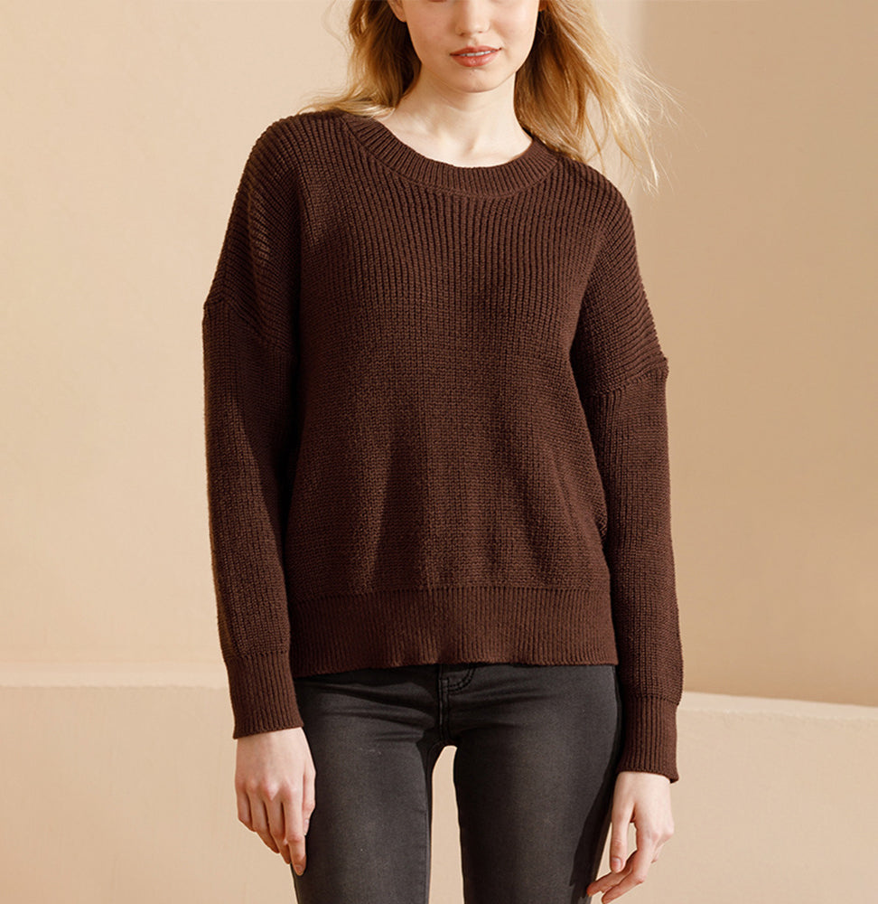 Suéter de punto de color liso con cuello redondo informal a la moda para mujer