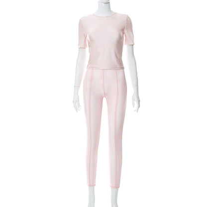 Conjunto de dos piezas para mujer: camiseta de cuello redondo de color liso y pantalón de malla informal que realza la cadera