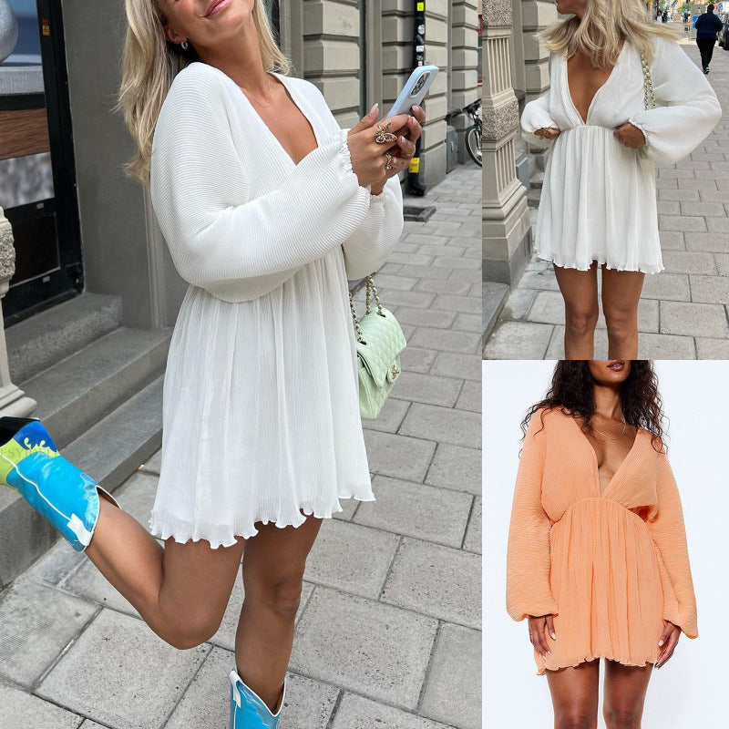 Vestido informal sexy de color sólido, suelto, de manga larga y escote en V profundo para mujer