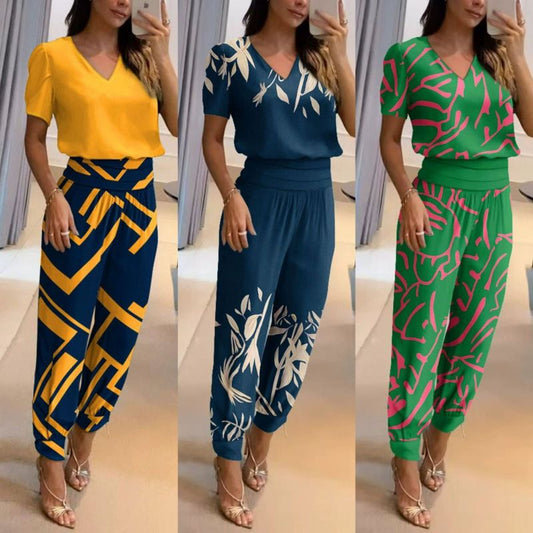 Conjunto de dos piezas de blusa y pantalón de manga corta con cuello en V y estampado de bloques de color para mujer