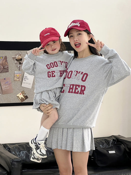 Conjunto de dos piezas de sudadera informal con estampado de letras y falda plisada para mujer