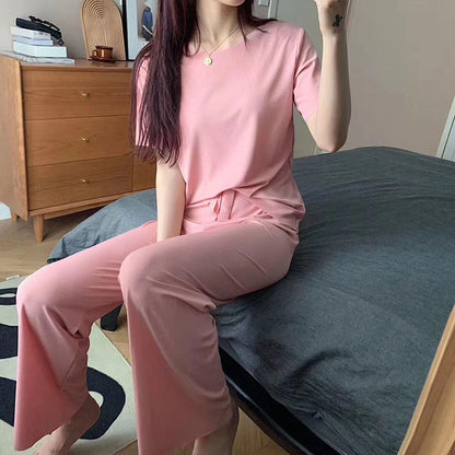 Conjunto de dos piezas de top y pantalón de manga corta de seda helada informal de verano para mujer