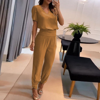 Conjunto de dos piezas de blusa y pantalón de manga corta con cuello en V y estampado de bloques de color para mujer
