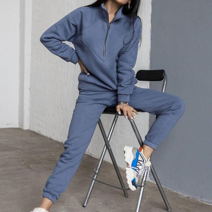 Conjunto de dos piezas de jersey deportivo informal con capucha y manga larga de color liso para mujer