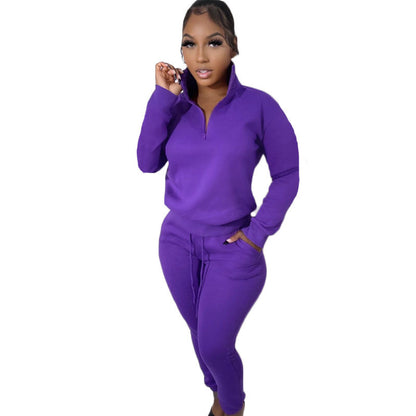 Conjunto deportivo informal de dos piezas para mujer, sudadera y pantalones de manga larga con cremallera y cuello alto en color liso