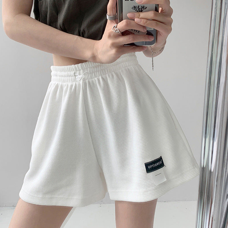 Pantalones cortos casuales de pierna ancha de color liso para mujer