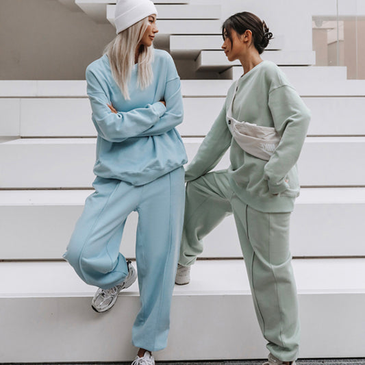 Conjunto de dos piezas holgado e informal con top y pantalón de manga larga y cuello redondo de color liso para mujer