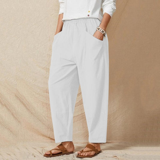Pantalones harén holgados con cintura elástica y costuras informales de color liso para mujer