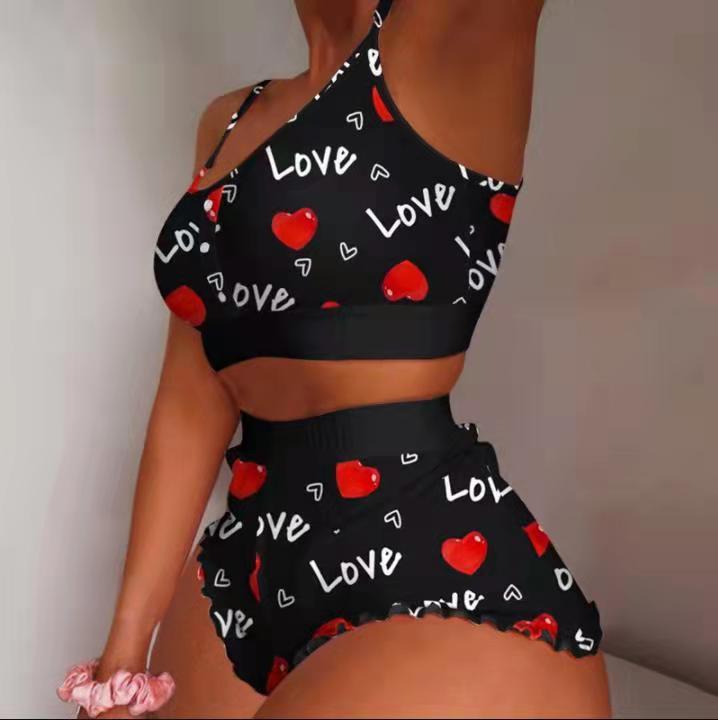 Conjunto de pijama informal atrevido con camisola y pantalones cortos sin mangas para mujer