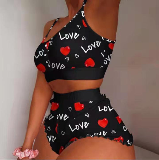Conjunto de pijama informal atrevido con camisola y pantalones cortos sin mangas para mujer