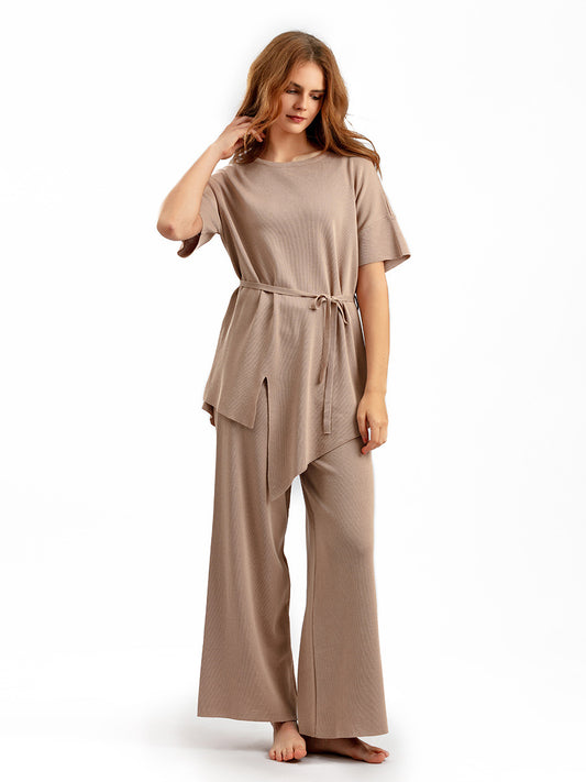 Conjunto de dos piezas de pantalón ancho y top irregular de color liso informal a la moda para mujer