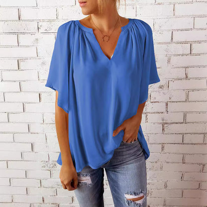 Blusa informal holgada de color liso con cuello en V y manga corta para mujer