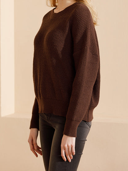 Suéter de punto de color liso con cuello redondo informal a la moda para mujer