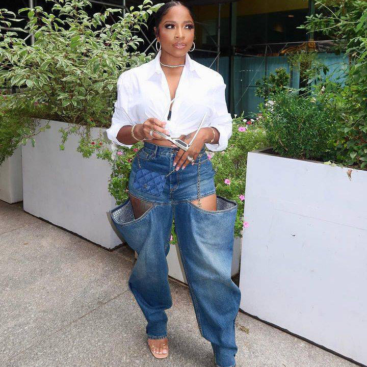 Vaqueros rasgados elásticos informales de moda para mujer