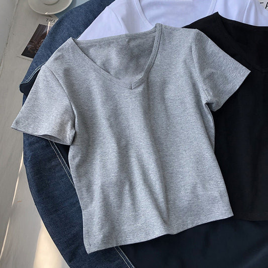 Camiseta básica informal de manga corta con cuello en V y color liso para mujer