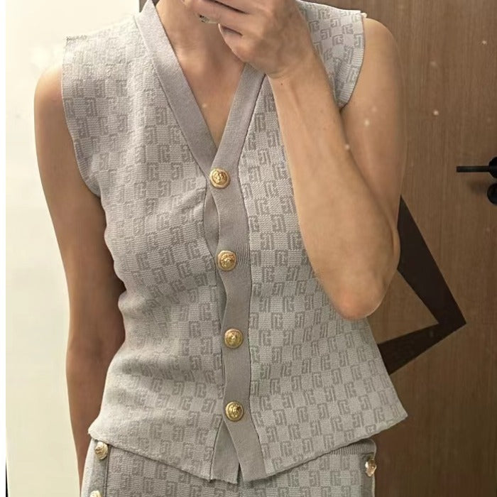 Conjunto de dos piezas de chaleco de punto sin mangas retro informal para mujer con hebilla de metal y pantalones de pierna ancha