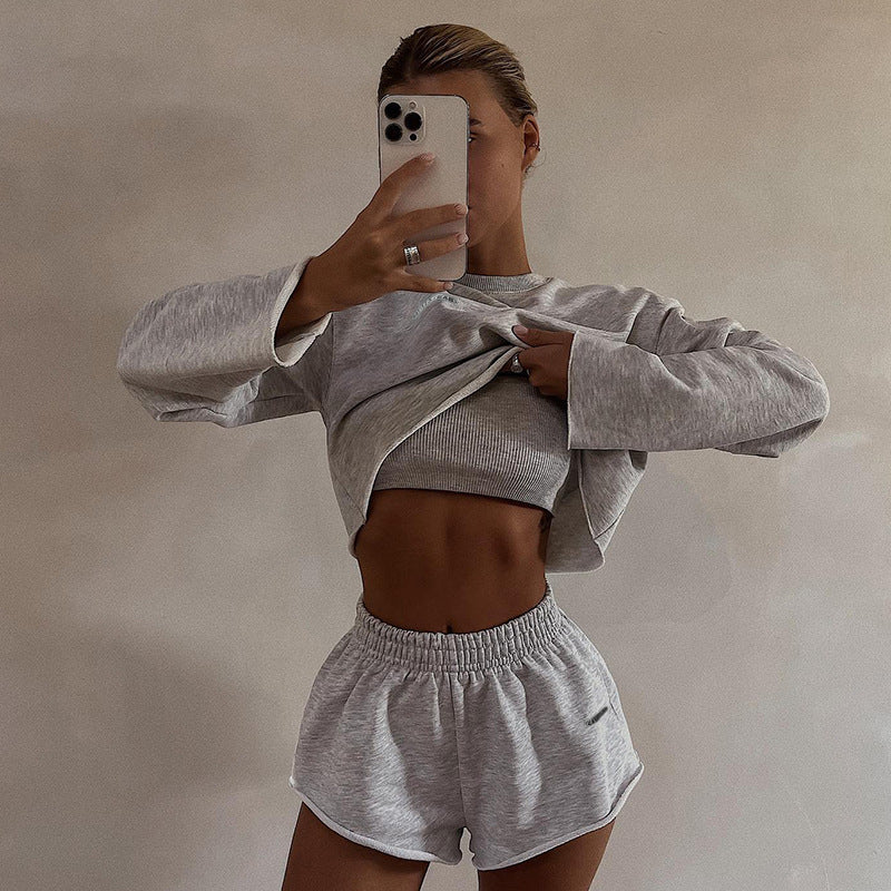 Conjunto deportivo informal de manga larga con jersey y pantalones cortos de color liso para mujer