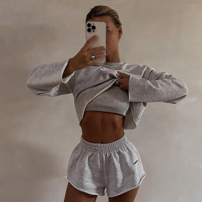 Conjunto deportivo informal de manga larga con jersey y pantalones cortos de color liso para mujer
