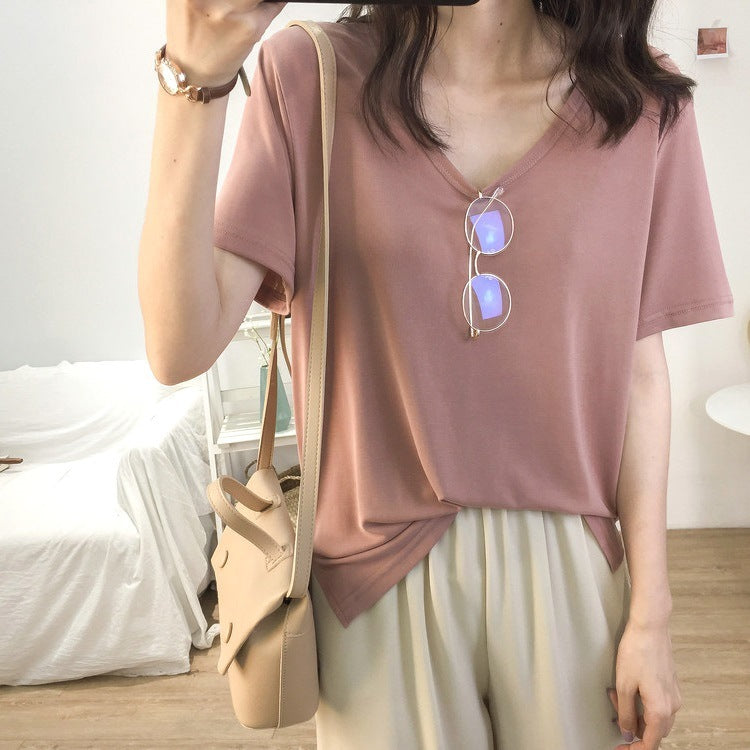 Camiseta holgada informal de color liso con cuello en V y manga corta para mujer