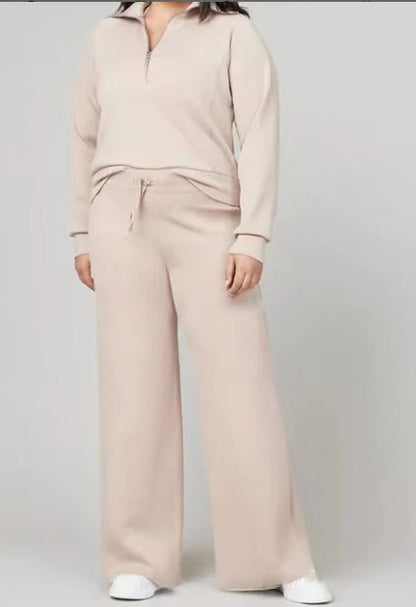 Conjunto de dos piezas formado por top y pantalón con cremallera, manga larga, color liso, informal, para mujer