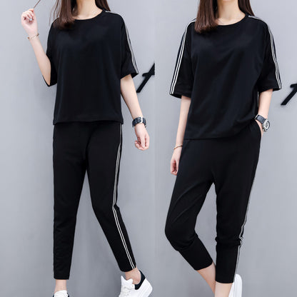 Conjunto de dos piezas de top y pantalón de manga corta con cuello redondo y rayas informales a la moda para mujer