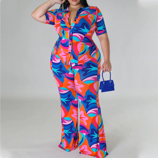 Conjunto de dos piezas de blusa y pantalón de manga corta con estampado gráfico y bloques de color, informal, de talla grande, para mujer