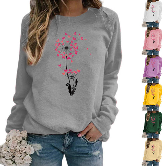 Sudadera holgada informal con estampado de diente de león y corazón para mujer, cuello redondo y manga larga