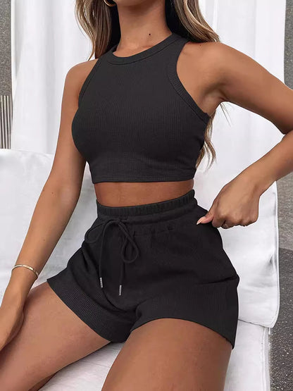 Conjunto de dos piezas formado por camiseta sin mangas y pantalones cortos con cordón, color liso, informal, a la moda de verano para mujer