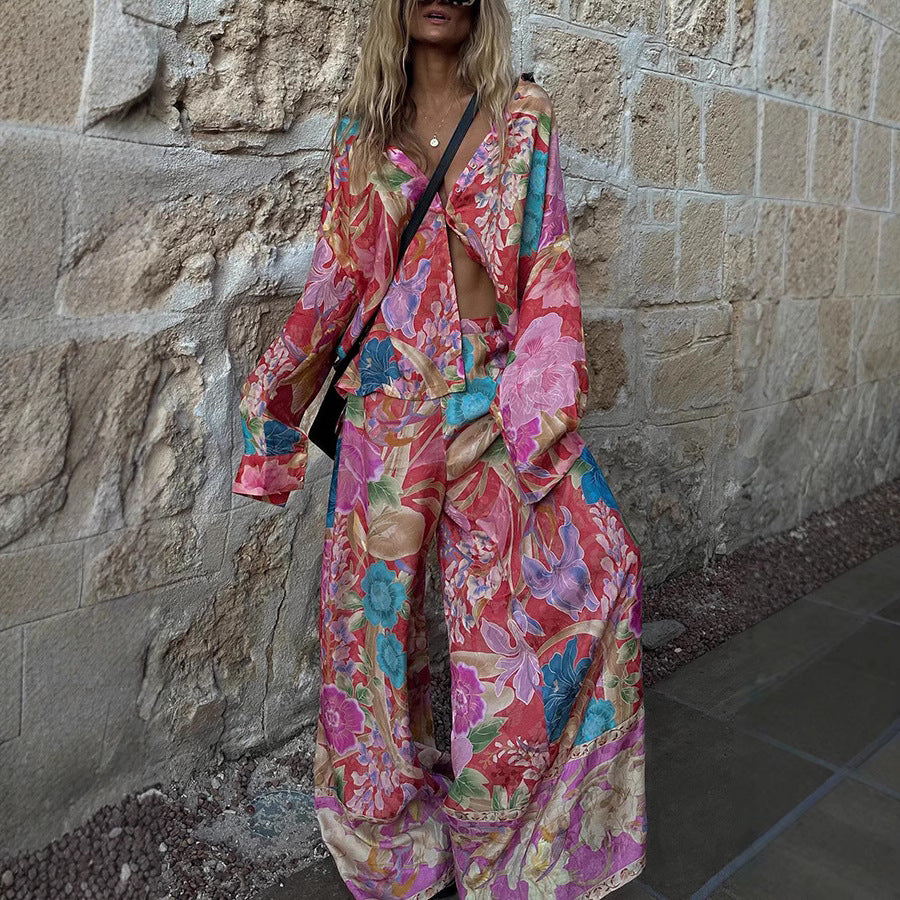 Conjunto de dos piezas de blusa y pantalones holgados de manga larga con solapa y estampado floral para mujer