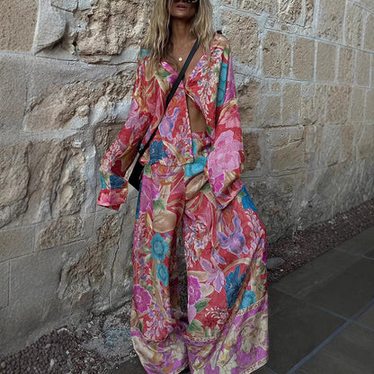 Conjunto de dos piezas de blusa y pantalones holgados de manga larga con solapa y estampado floral para mujer
