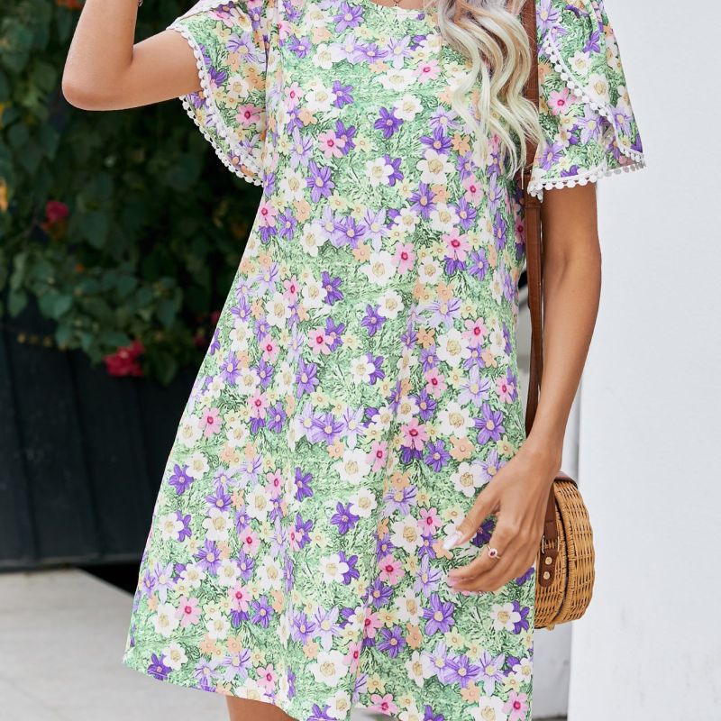 Vestido informal de mujer con cuello redondo, estampado floral, encaje y borlas