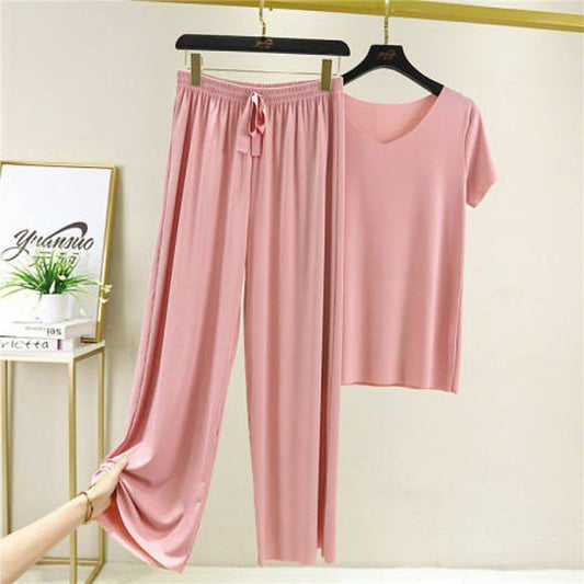Conjunto de dos piezas de camiseta y pantalón de seda helada de color liso informal para mujer