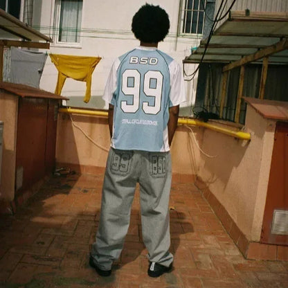Camiseta de jersey de manga corta con cuello en V y estampado digital holgado informal para mujer