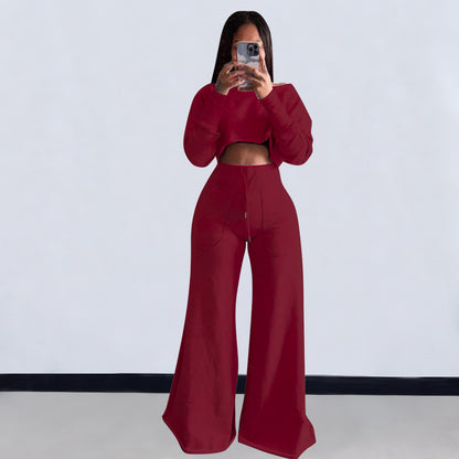 Conjunto de dos piezas de top corto de manga larga y pantalones ajustados de color liso informal para mujer