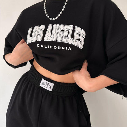 Conjunto de sudadera y pantalones de manga corta con estampado de letras y nombre de ciudad para mujer