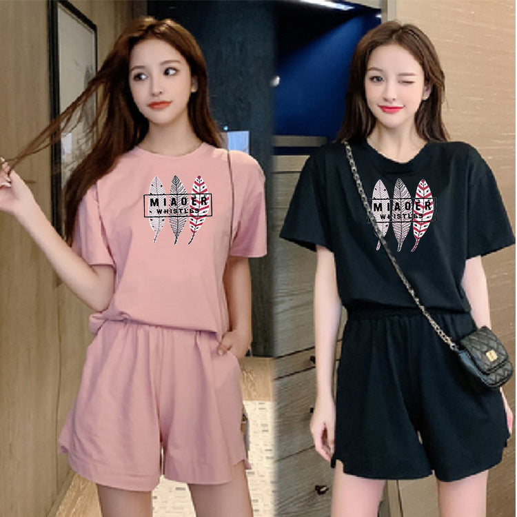Conjunto de 2 piezas de camiseta de manga corta con cuello redondo, pantalones cortos y cintura definida para mujer