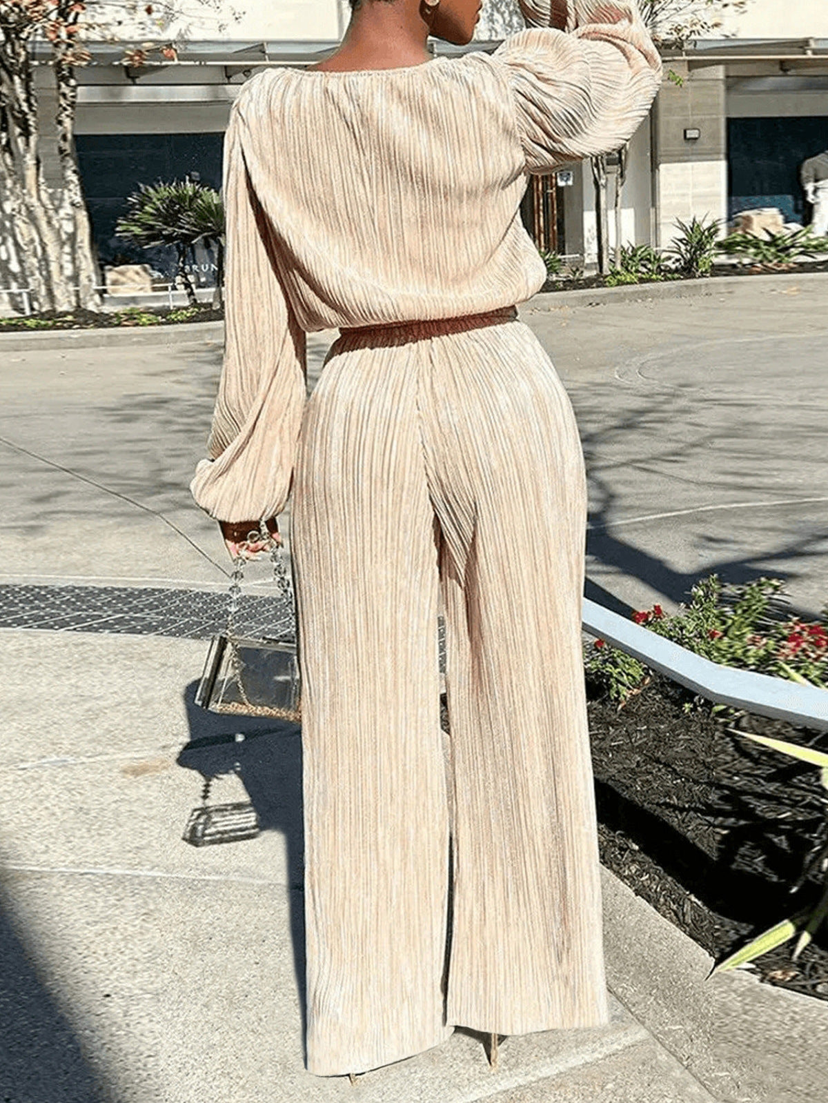 Conjunto de dos piezas de pantalón recto y top holgado de manga larga plisado informal a la moda para mujer