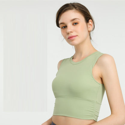 Camiseta deportiva sin mangas con cuello redondo, transpirable, de color sólido y ajustada, informal para mujer