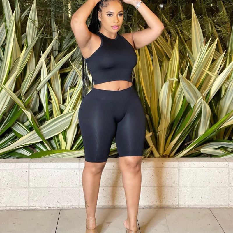 Conjunto deportivo de dos piezas para mujer, de verano, con camiseta sin mangas y pantalones cortos de color liso