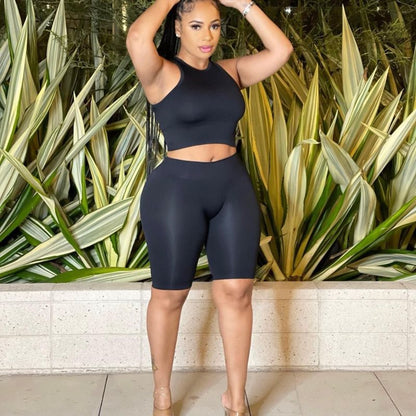 Conjunto deportivo de dos piezas para mujer, de verano, con camiseta sin mangas y pantalones cortos de color liso