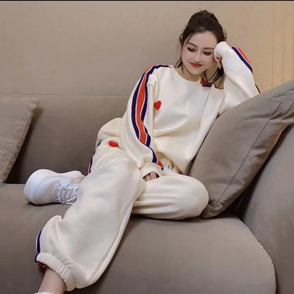 Conjunto de dos piezas holgado e informal con top y pantalón de manga larga con cuello redondo y estampado en contraste para mujer