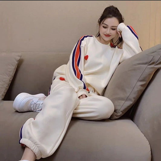 Conjunto de dos piezas holgado e informal con top y pantalón de manga larga con cuello redondo y estampado en contraste para mujer