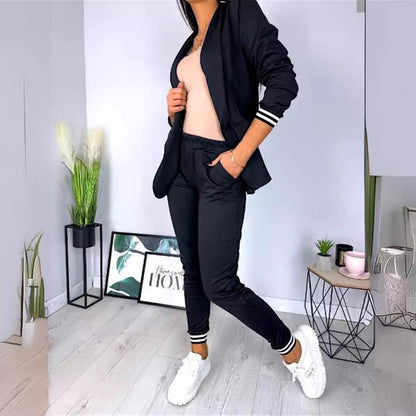 Conjunto de dos piezas formado por chaqueta y pantalón, manga larga, color liso, informal, a la moda para mujer