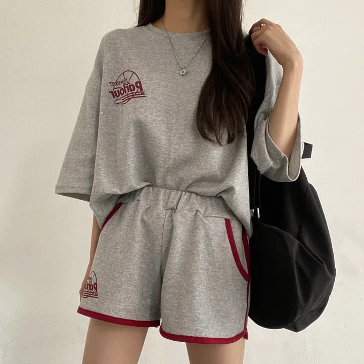 Conjunto de dos piezas de camiseta de manga corta con estampado informal y pantalones cortos holgados para mujer
