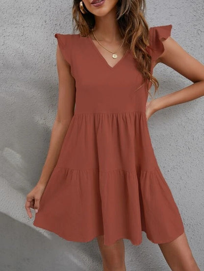 Vestido informal de mujer con cuello en V, mangas con volantes y costuras de color liso